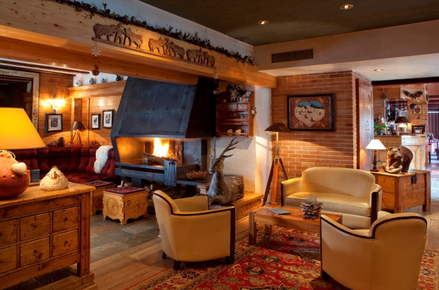 Salon Cheminée - © Hotel les Melezes Salon Cheminée